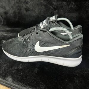 Nike Free RN Womens Size 7.5 Running Shoes Black White Mesh Athletic Sneaker